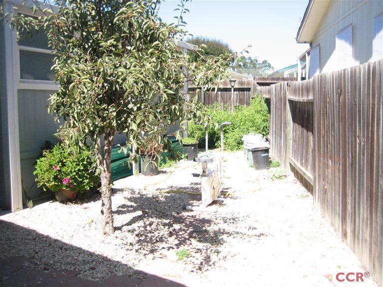 4750 South Blosser Road, Unit 318 Santa Maria, CA 93455 - Photo 4 of 17 a view of a backyard of the house