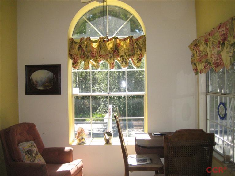 4750 South Blosser Road, Unit 318 Santa Maria, CA 93455 - Photo 9 of 17 a living room with furniture and a window