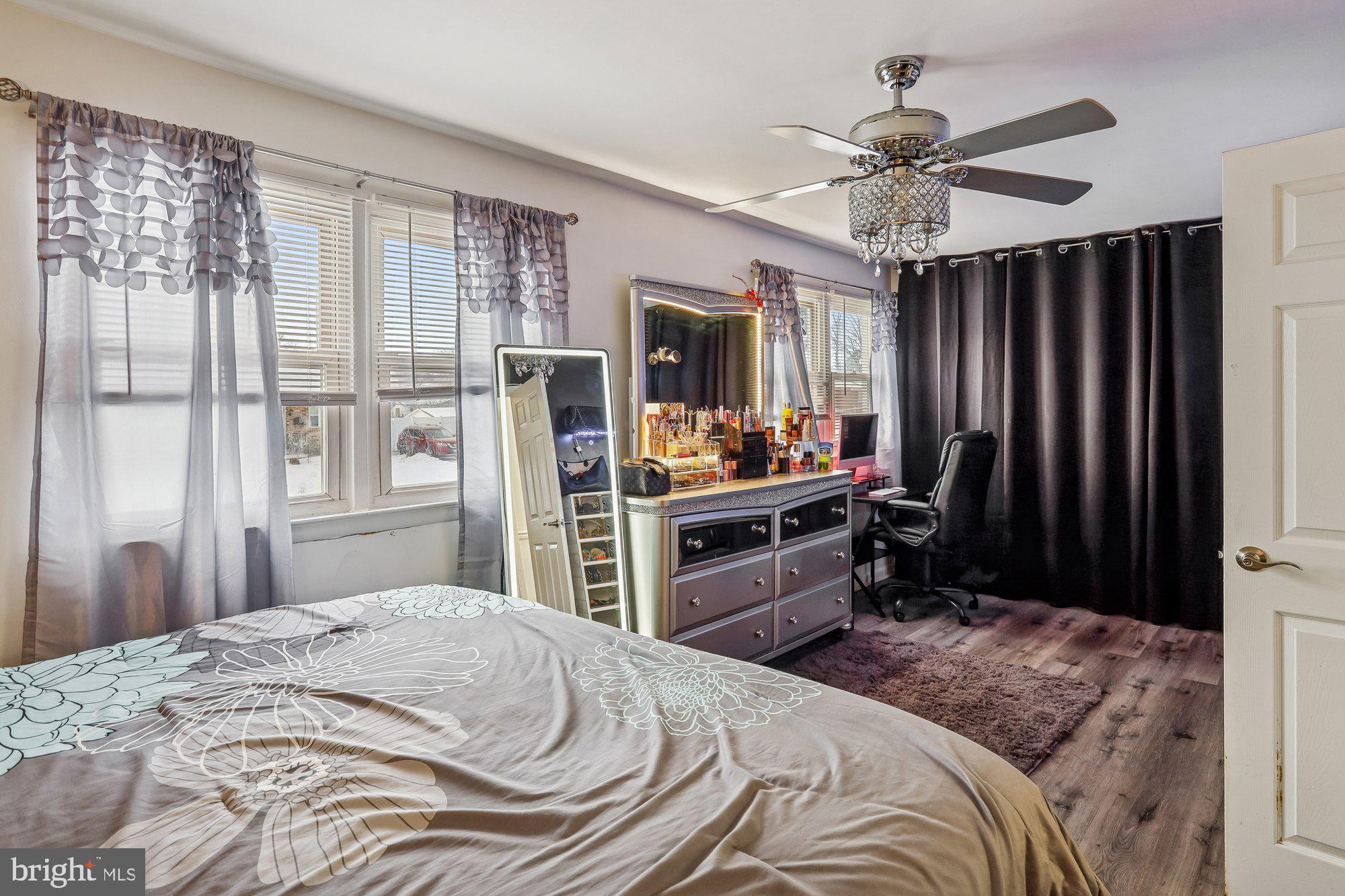 3723 Eastman Road Randallstown, MD 21133 - Photo 18 of 36 a bedroom with a bed dresser and a window