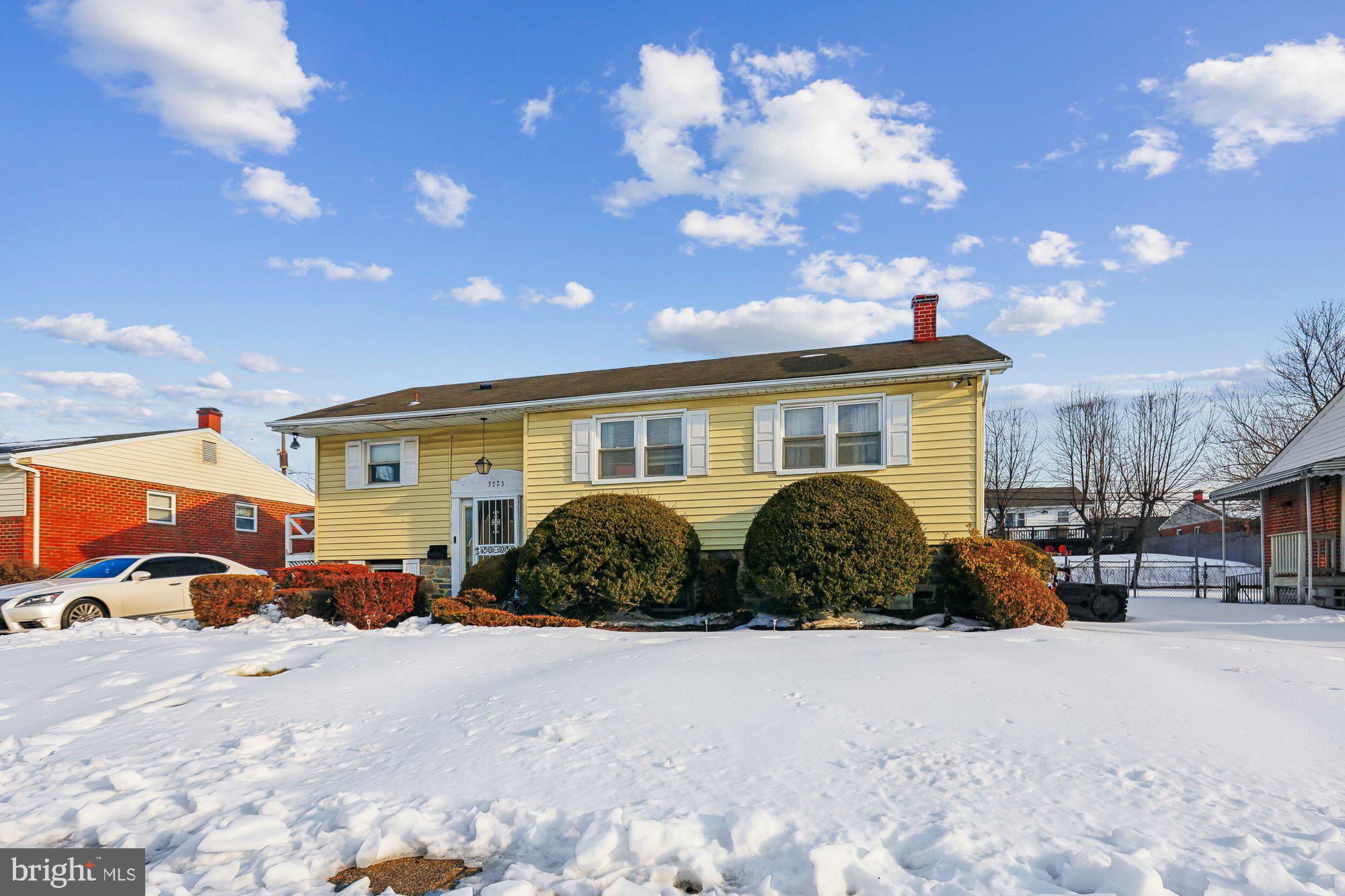 3723 Eastman Road Randallstown, MD 21133 - Photo 2 of 36 a front view of a house with a garden