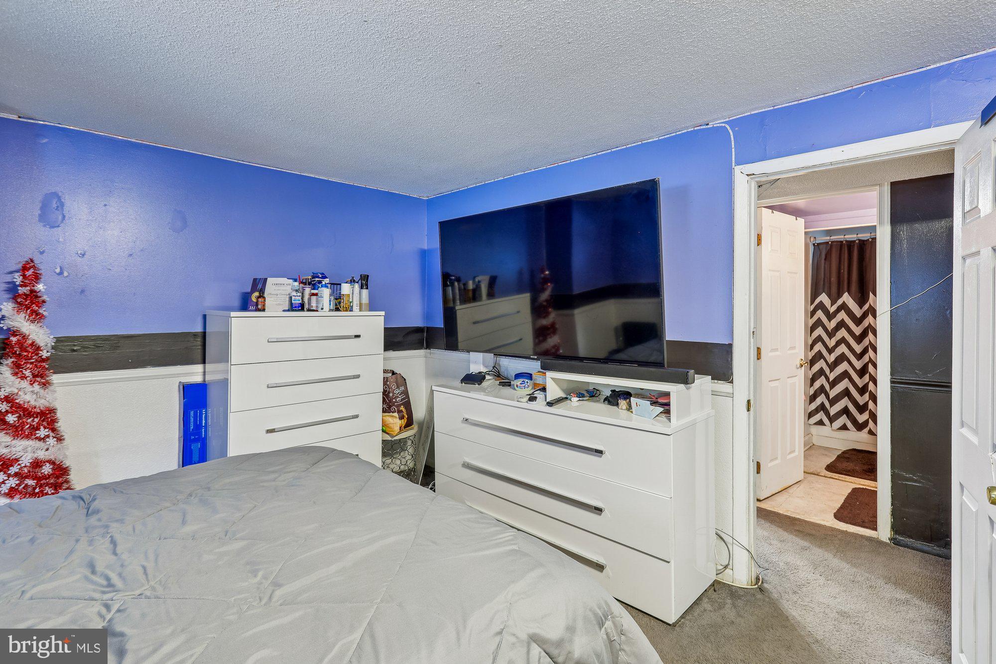 3723 Eastman Road Randallstown, MD 21133 - Photo 23 of 36 a room with a bed and a view of kitchen