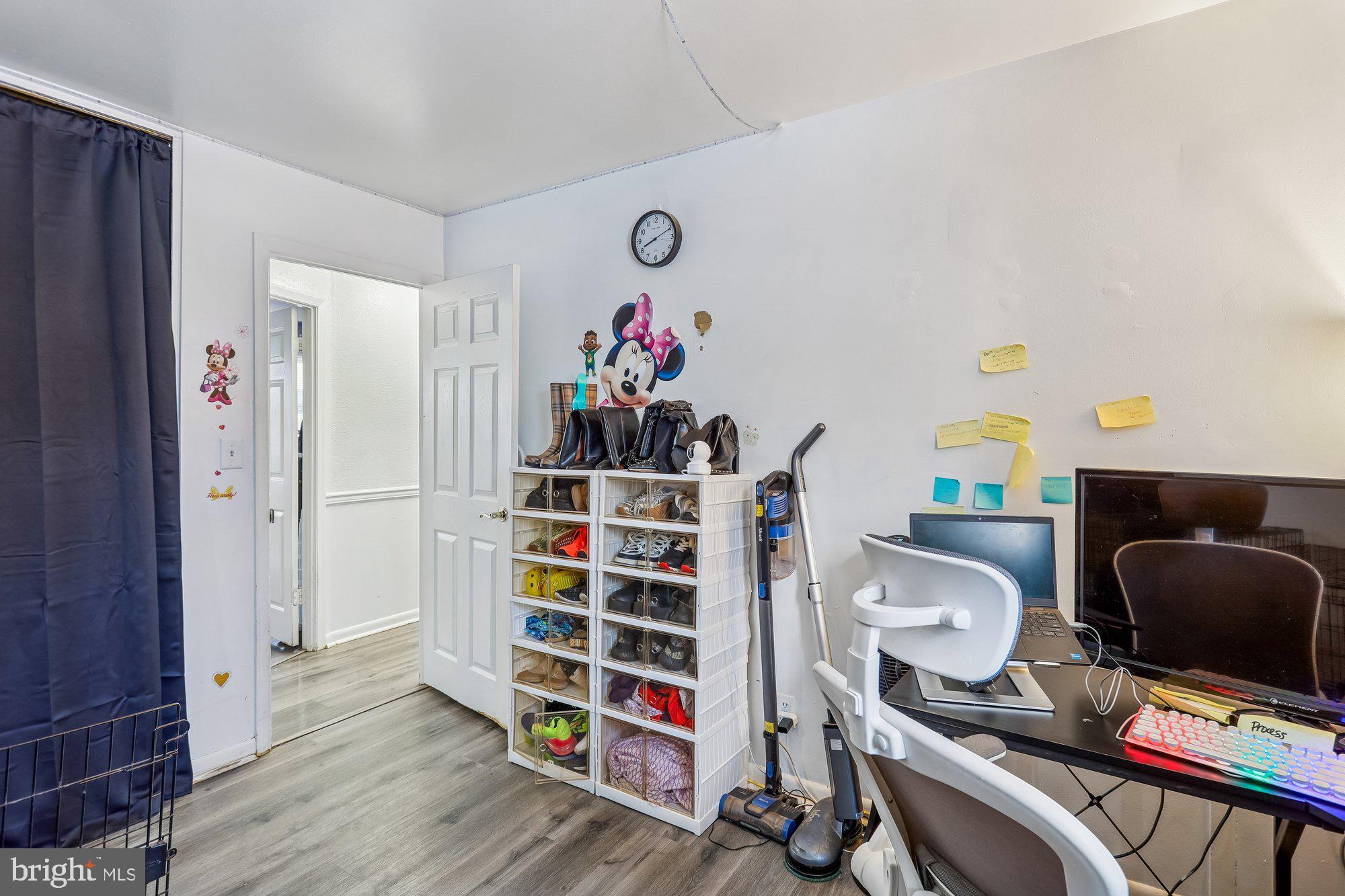 3723 Eastman Road Randallstown, MD 21133 - Photo 25 of 36 a view of workspace with wooden floor shelves