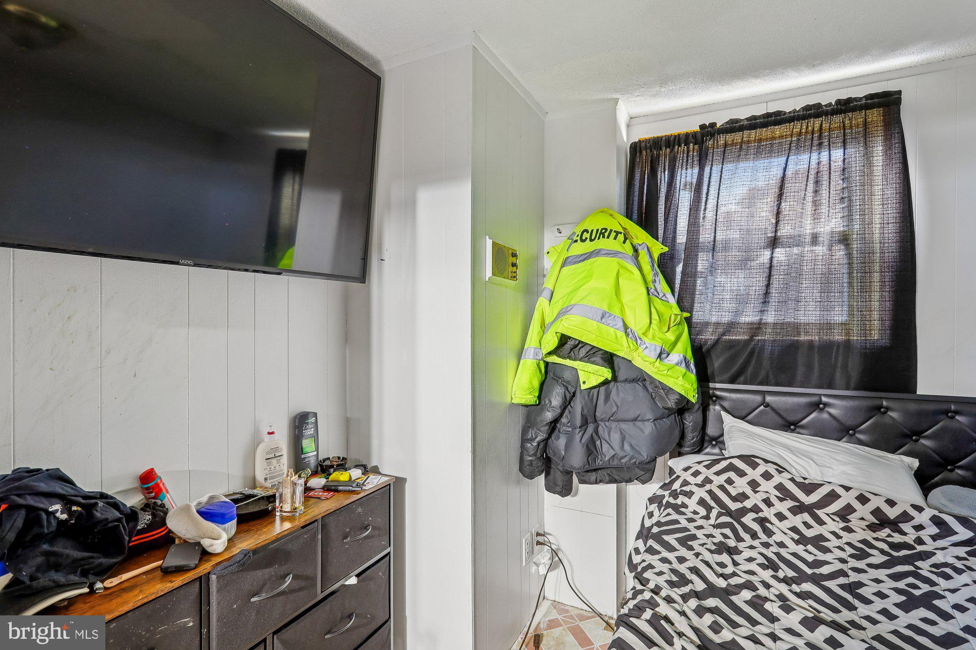 3723 Eastman Road Randallstown, MD 21133 - Photo 27 of 36 a bedroom with a bed and a window