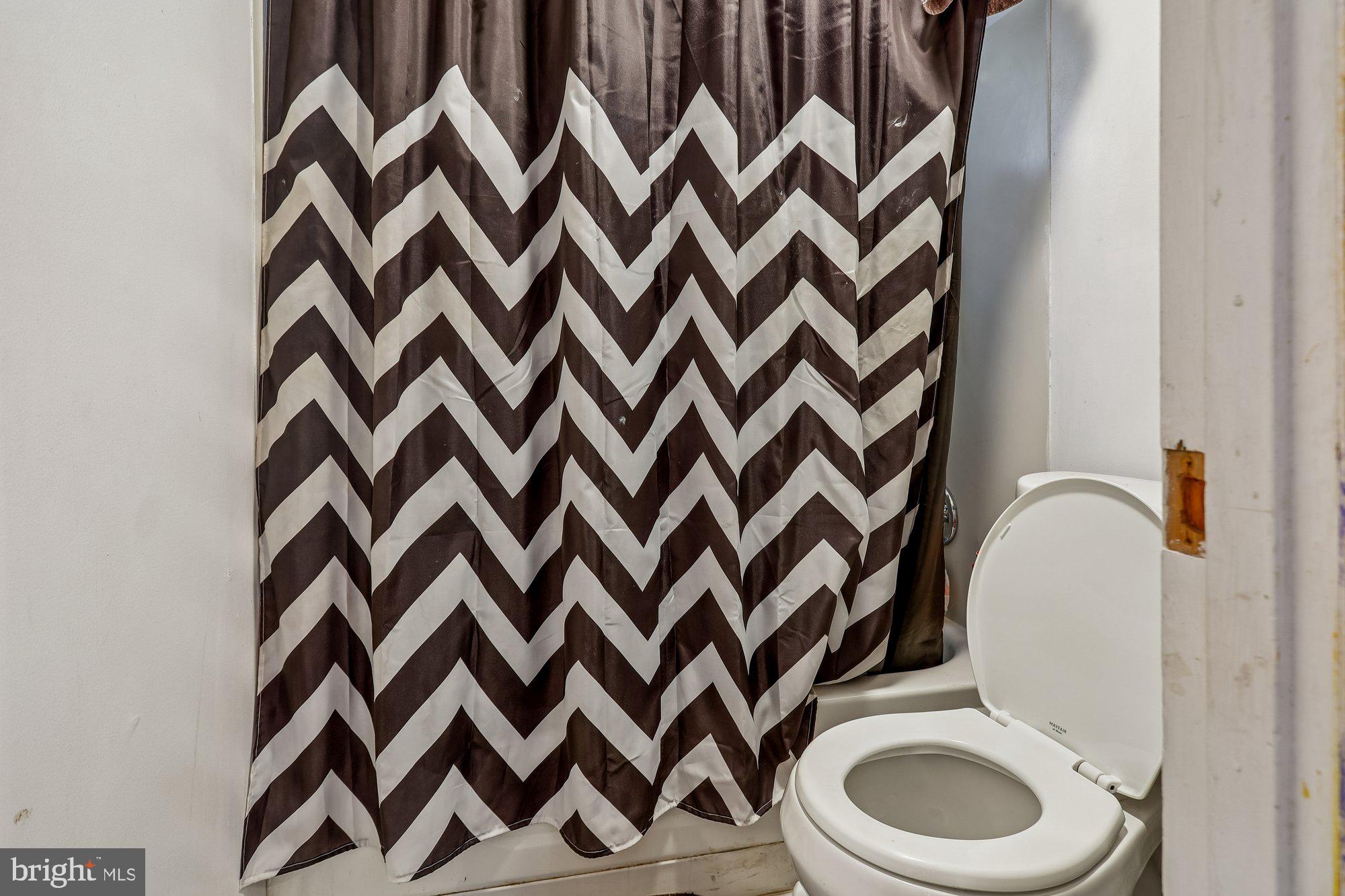 3723 Eastman Road Randallstown, MD 21133 - Photo 29 of 36 a bathroom with a sink and a mirror