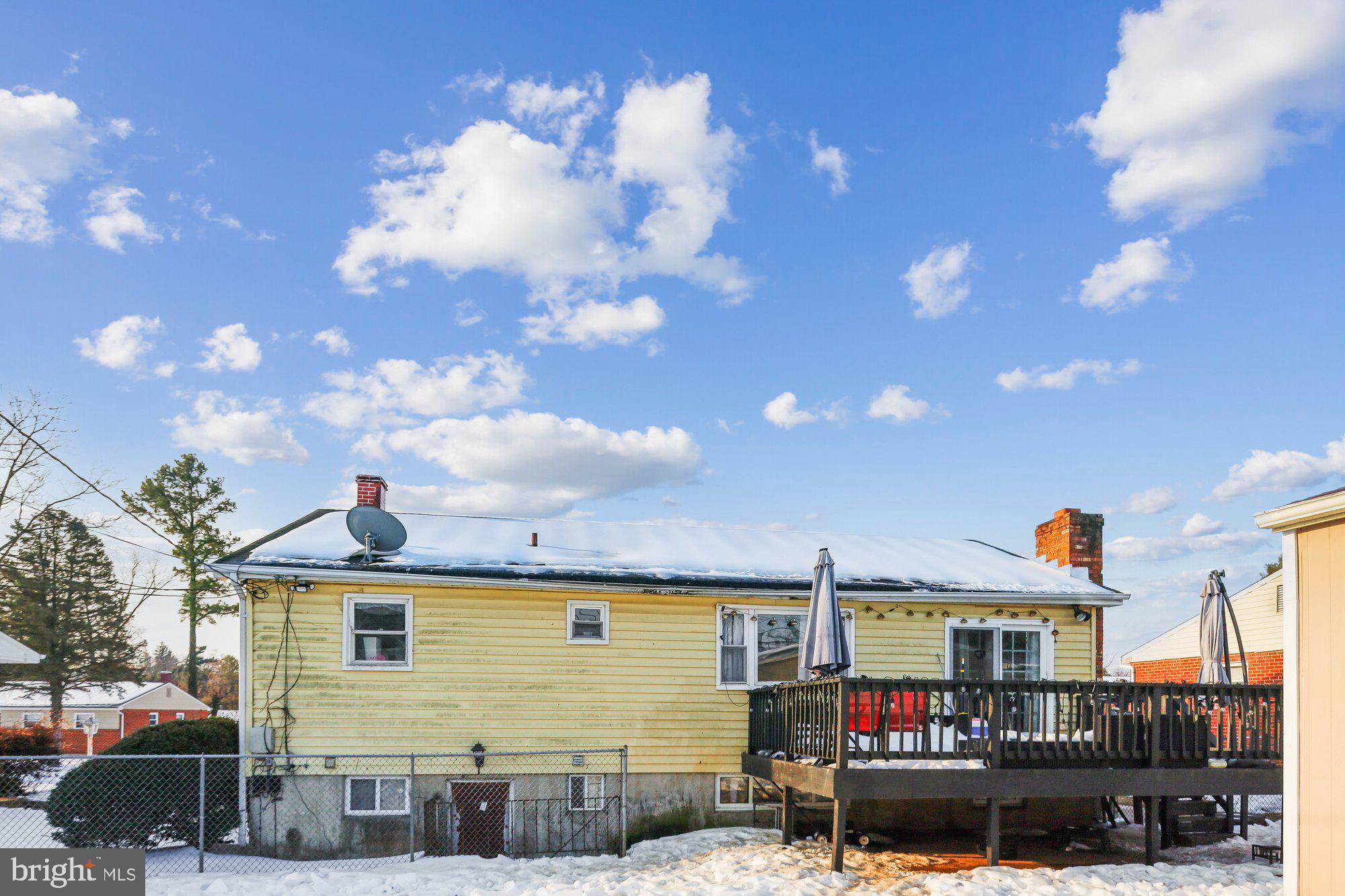 3723 Eastman Road Randallstown, MD 21133 - Photo 34 of 36 a front view of a house with street