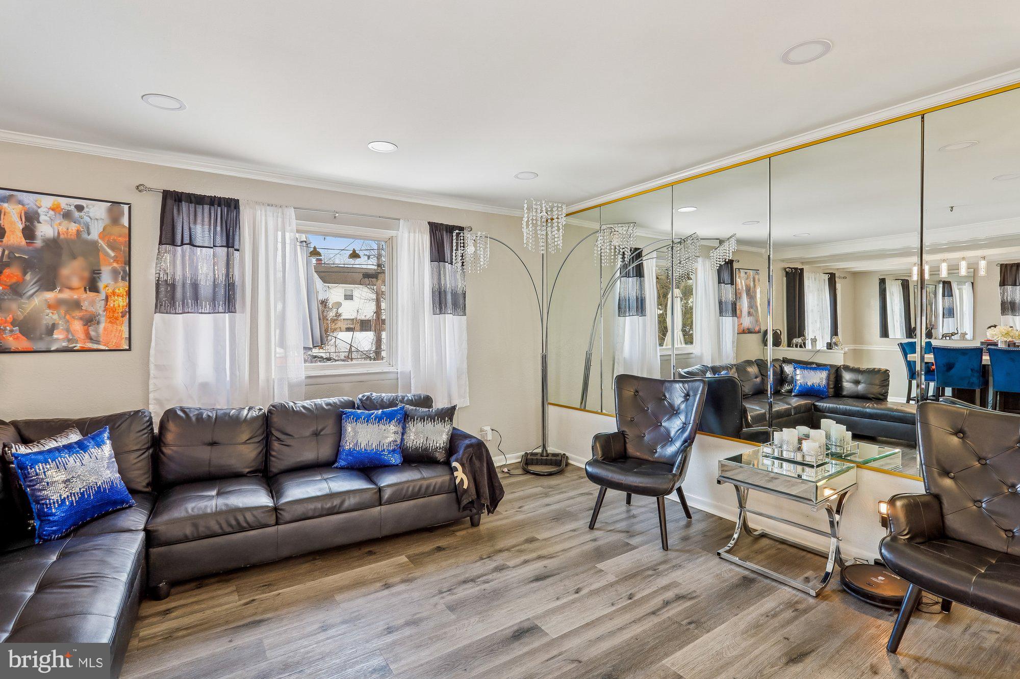 3723 Eastman Road Randallstown, MD 21133 - Photo 5 of 36 a living room with furniture and a wooden floor