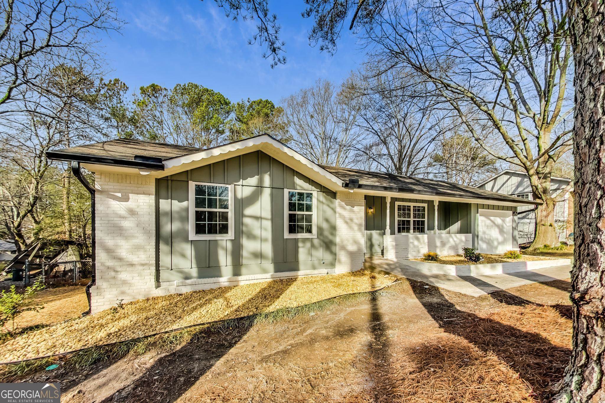 6499 Sinclair Place Morrow, GA 30260 - Photo 1 of 1 a view of a house with a patio yard
