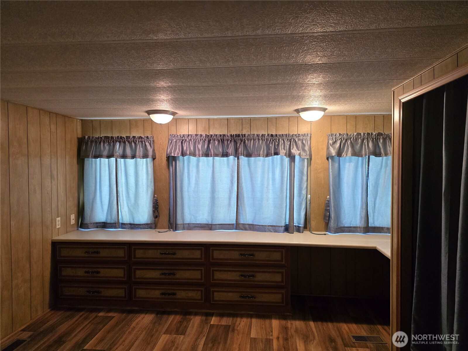 147-21 Morris Road, Unit 21 Randle, WA 98377 - Photo 30 of 31 a view of room with wooden floor and a window