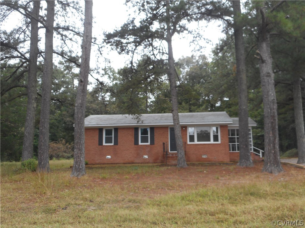 21469 Cabin Point Road Disputanta, VA 23842 - Photo 1 of 12 Brick Rancher's front view