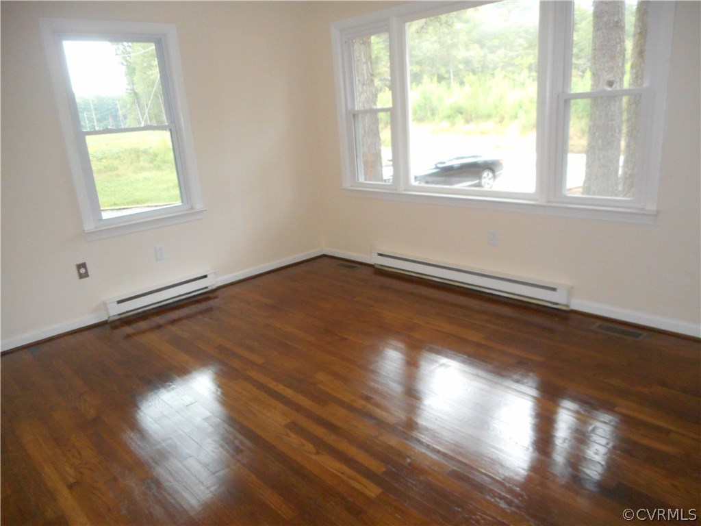 21469 Cabin Point Road Disputanta, VA 23842 - Photo 3 of 12 Living room very bright and look at the shiny floo