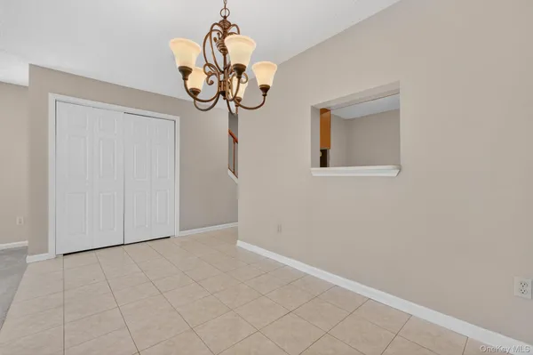 a view of a room and window
