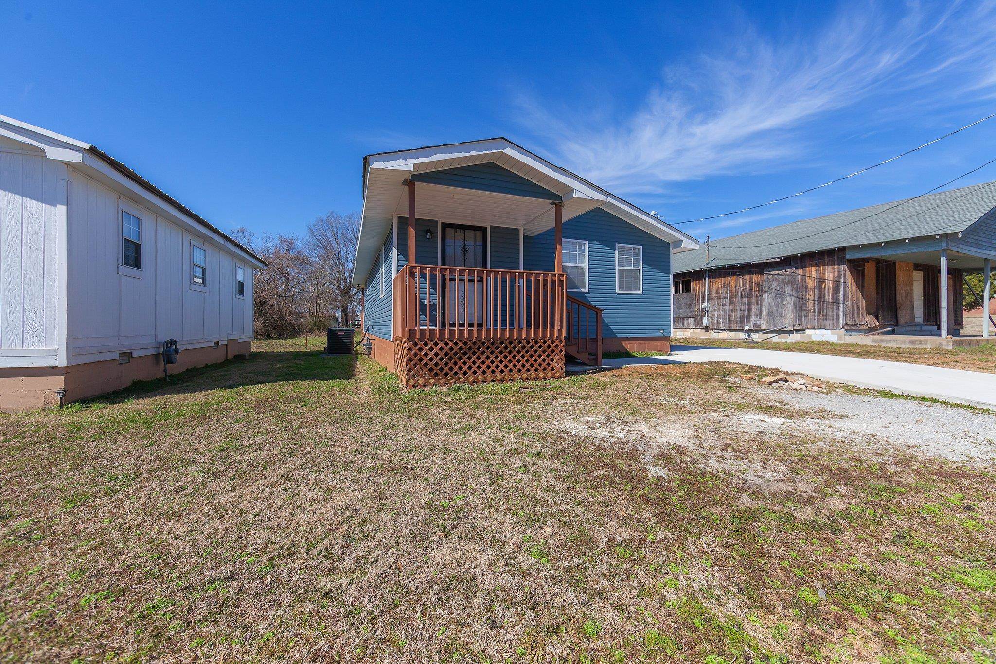 115 Carson Street Jackson, TN 38301 - Photo 2 of 14 a view of a house with a yard