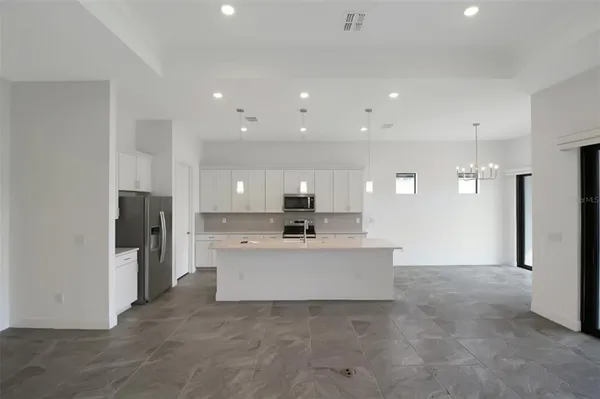 a view of a kitchen with a sink
