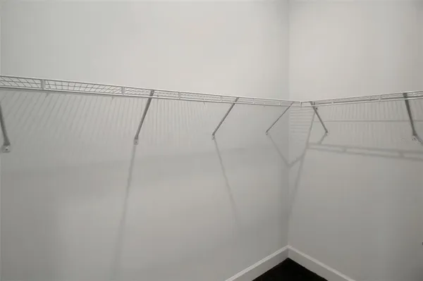 a view of a room with racks on the wall