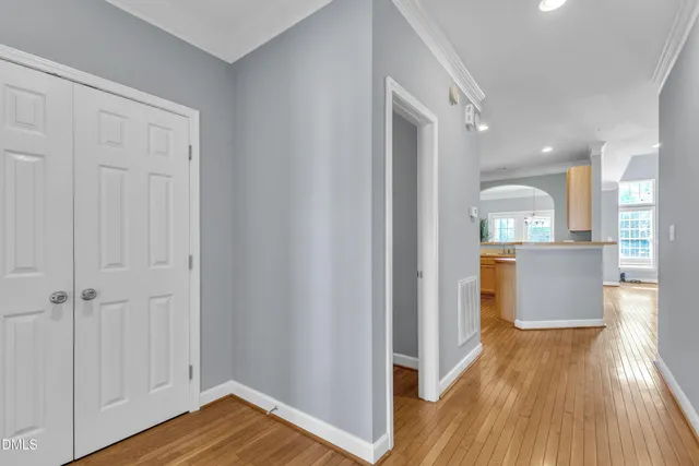 a view of a garden with a building in the background