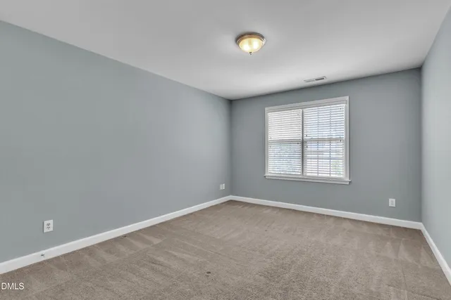 a view of a hallway with entryway