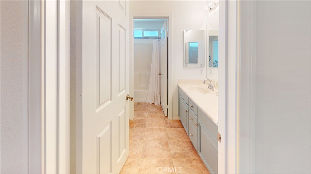 1279 Longbranch Road San Jacinto, CA 92582 - Photo 25 of 35 a view of a bathroom from a hallway