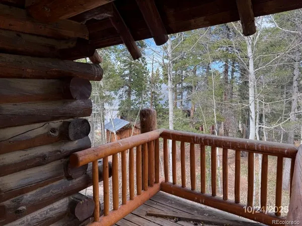 a view of balcony with wooden floor