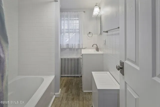 a outdoor living space with patio furniture and potted plants