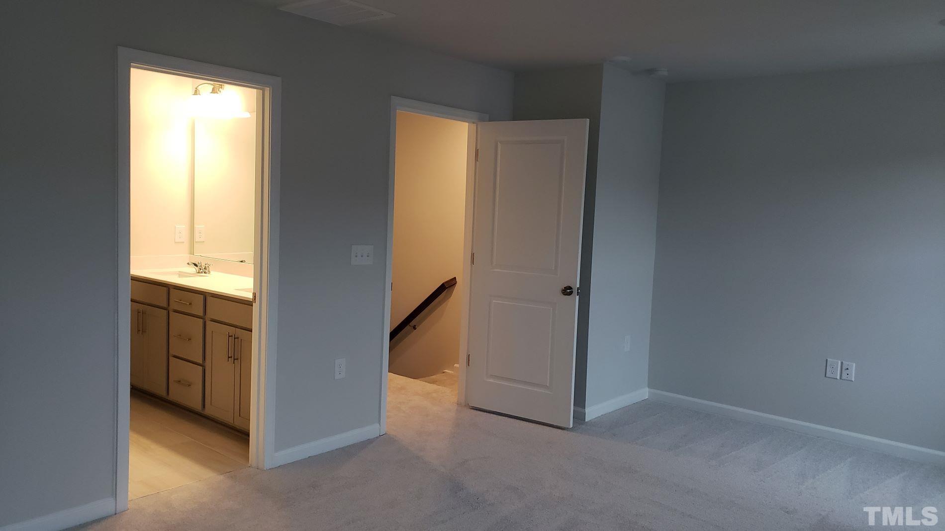 1833 Joscara Lane, Unit 1833 Apex, NC 27502 - Photo 16 of 37 a view of an empty room and window