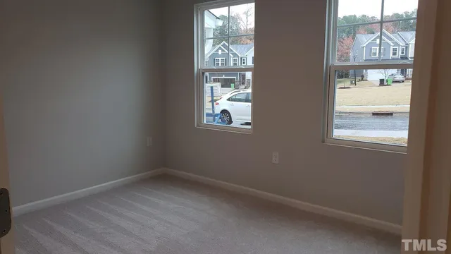 a bathroom with a toilet and a bathtub