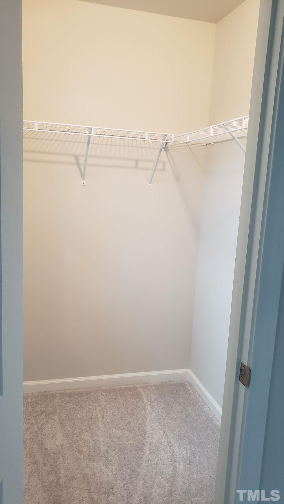 1833 Joscara Lane, Unit 1833 Apex, NC 27502 - Photo 24 of 37 a view of small space with racks on the wall