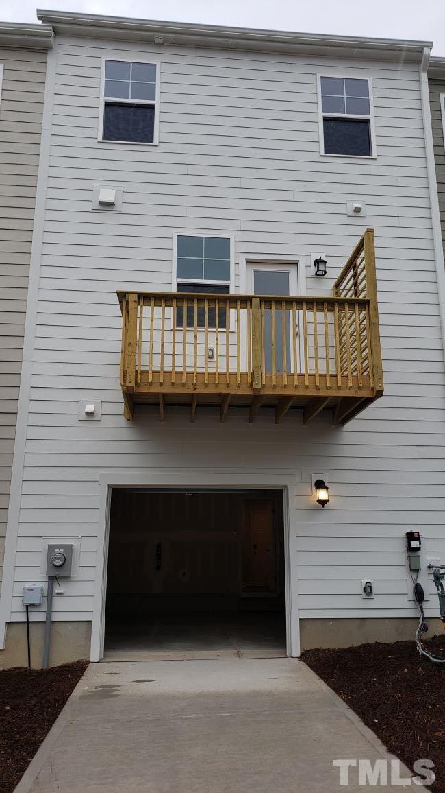 1833 Joscara Lane, Unit 1833 Apex, NC 27502 - Photo 36 of 37 a front view of a house with roof deck