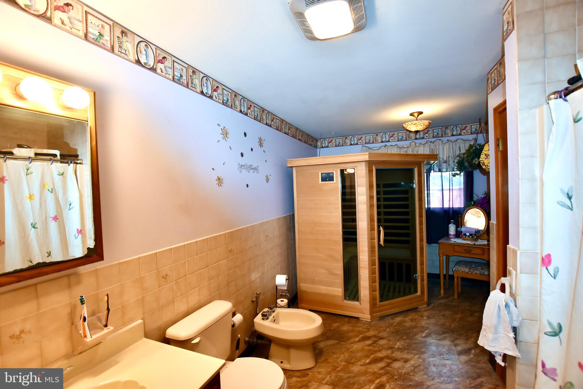 109 Hunter Drive Newfield, NJ 08344 - Photo 19 of 36 Main Bathroom with Bidet and two person Dry Sauna