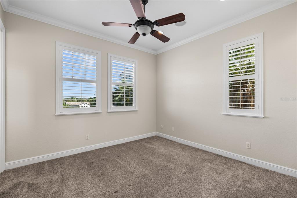 6002 Printery Street, Unit 105 Tampa, FL 33616 - Photo 21 of 64 a view of an empty room with a window