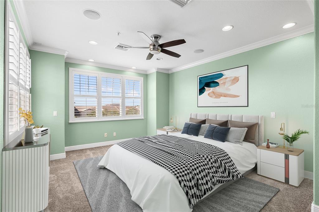 6002 Printery Street, Unit 105 Tampa, FL 33616 - Photo 33 of 64 a bedroom with a large bed and a window