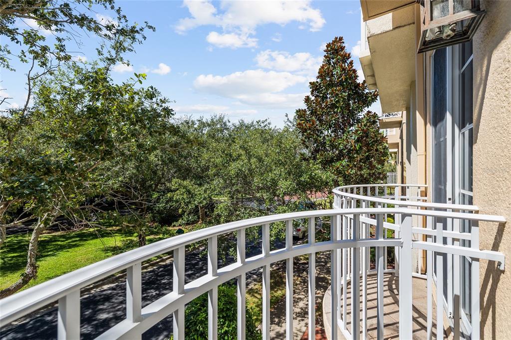 6002 Printery Street, Unit 105 Tampa, FL 33616 - Photo 40 of 64 a view of a balcony with yard