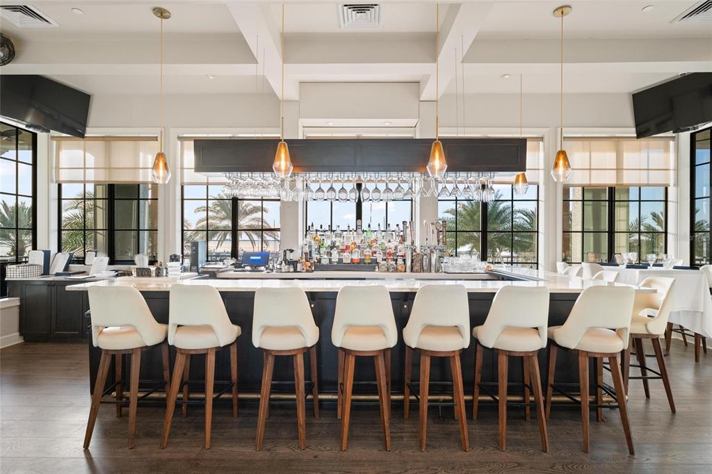 6002 Printery Street, Unit 105 Tampa, FL 33616 - Photo 51 of 64 a large dining space with furniture window and outside view