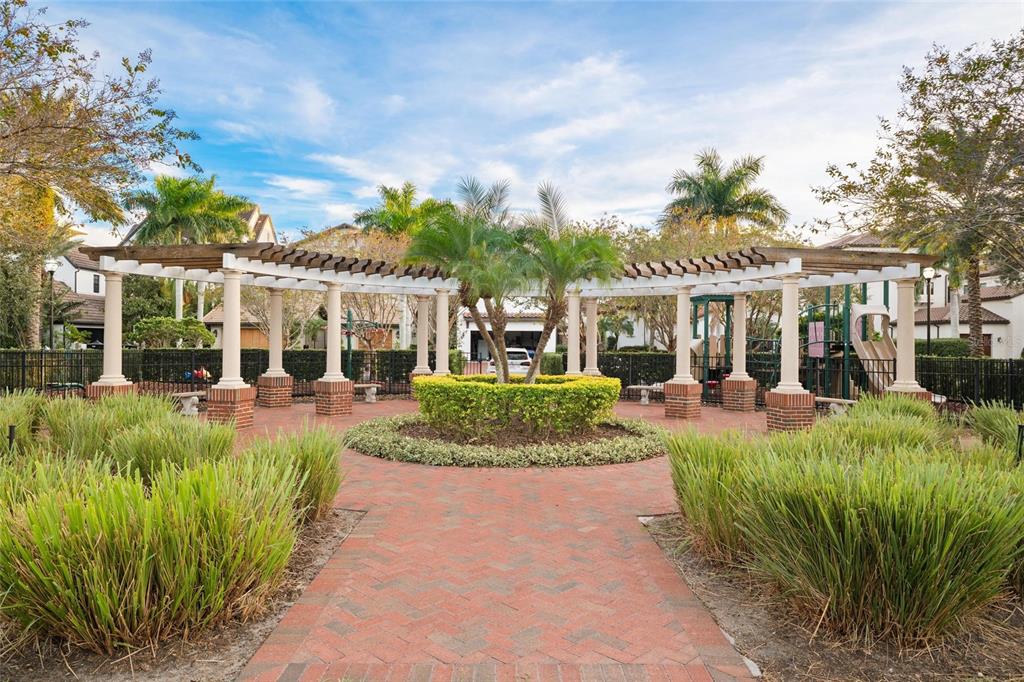 6002 Printery Street, Unit 105 Tampa, FL 33616 - Photo 58 of 64 front view of a house with a patio