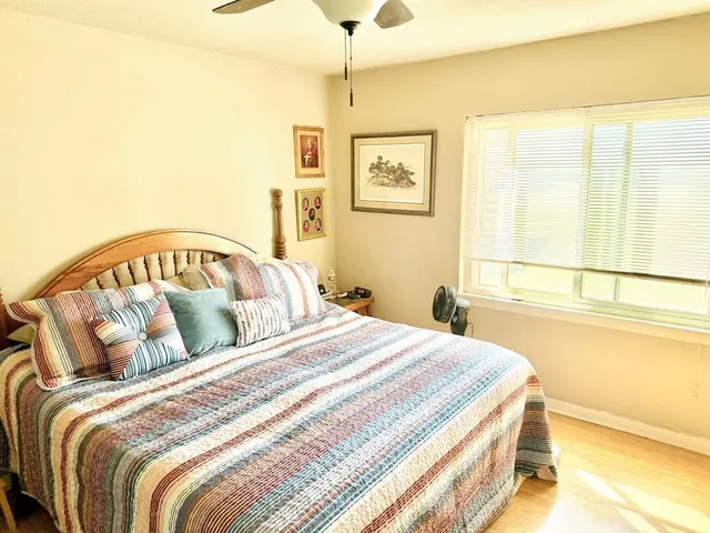 a view of a swimming pool with an outdoor space and seating area
