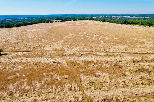 a view of roof deck with patio