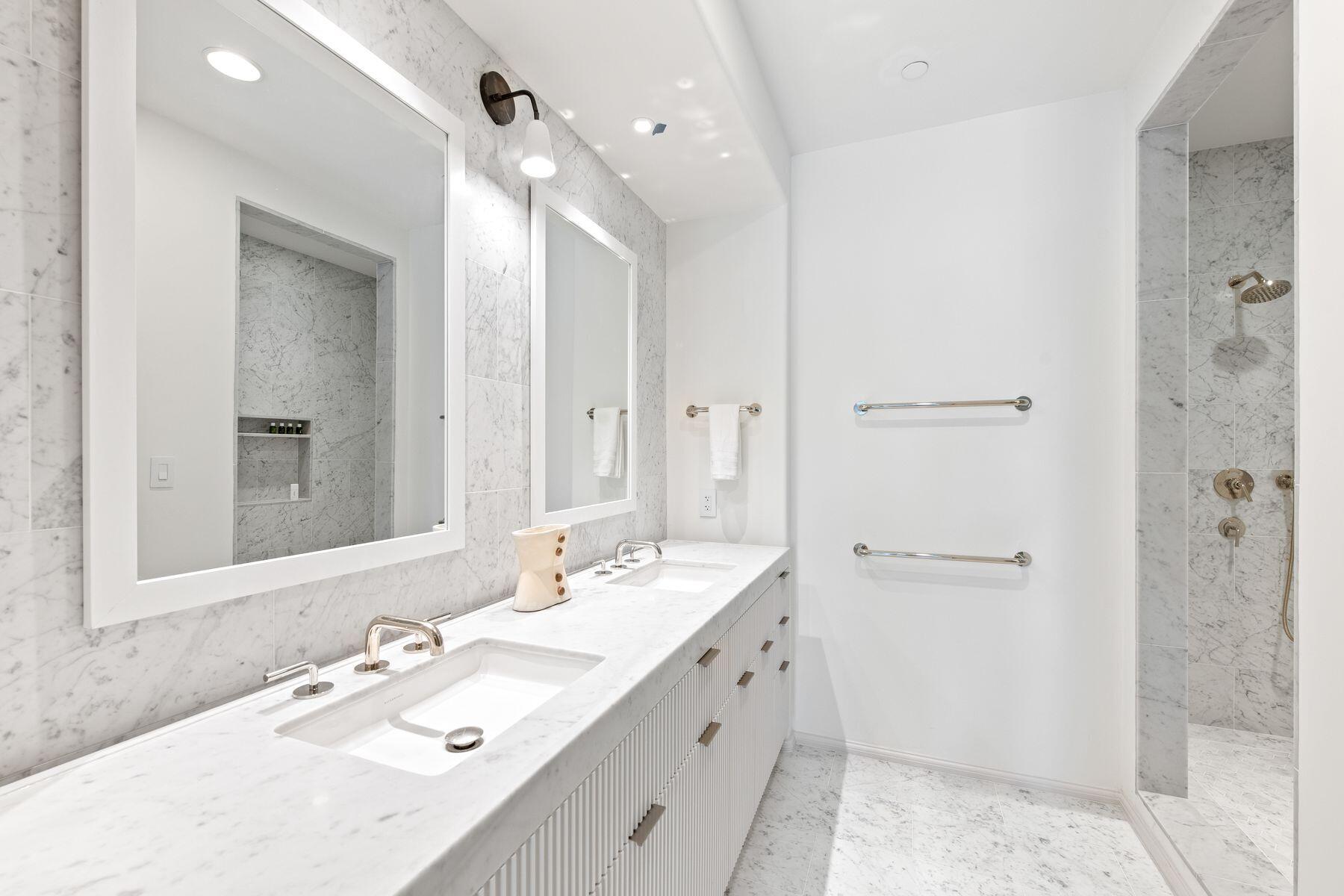 45 West Solaire Way Inlet Beach, Unit 103 Inlet Beach, FL 32461 - Photo 13 of 25 a bathroom with a double vanity sink mirror and shower