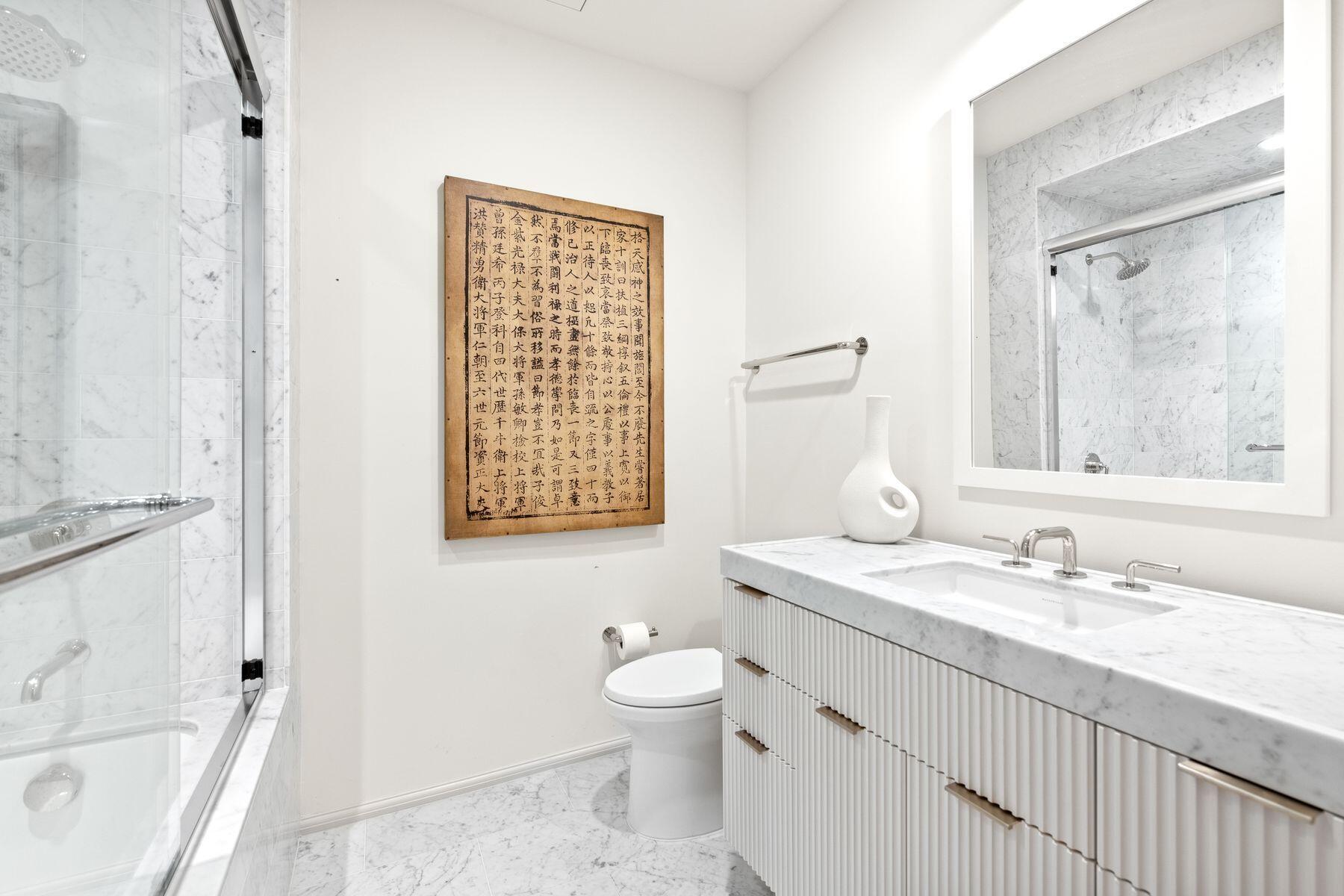 45 West Solaire Way Inlet Beach, Unit 103 Inlet Beach, FL 32461 - Photo 16 of 25 a bathroom with a granite countertop sink toilet and shower