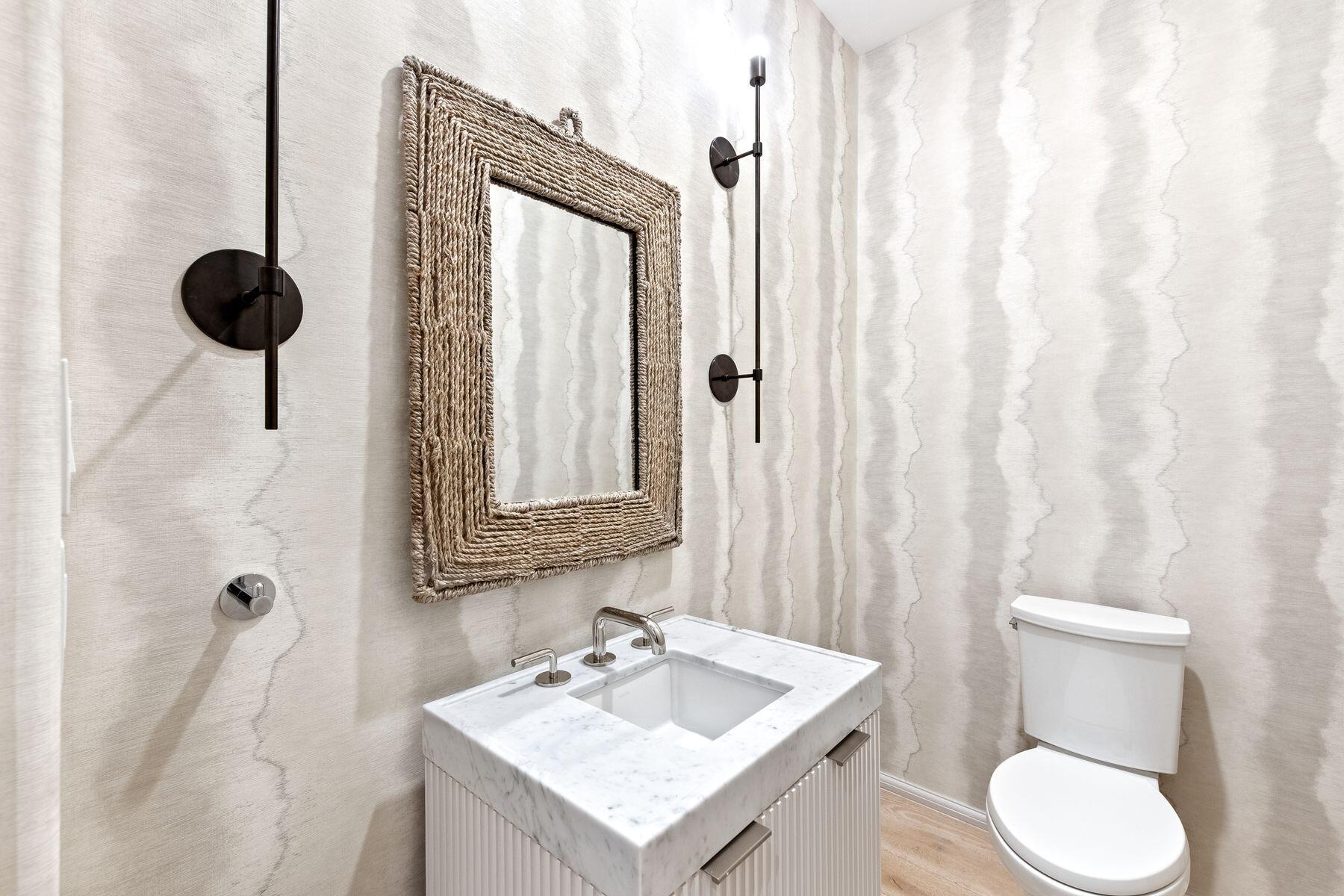 45 West Solaire Way Inlet Beach, Unit 103 Inlet Beach, FL 32461 - Photo 18 of 25 a bathroom with a sink toilet and shower