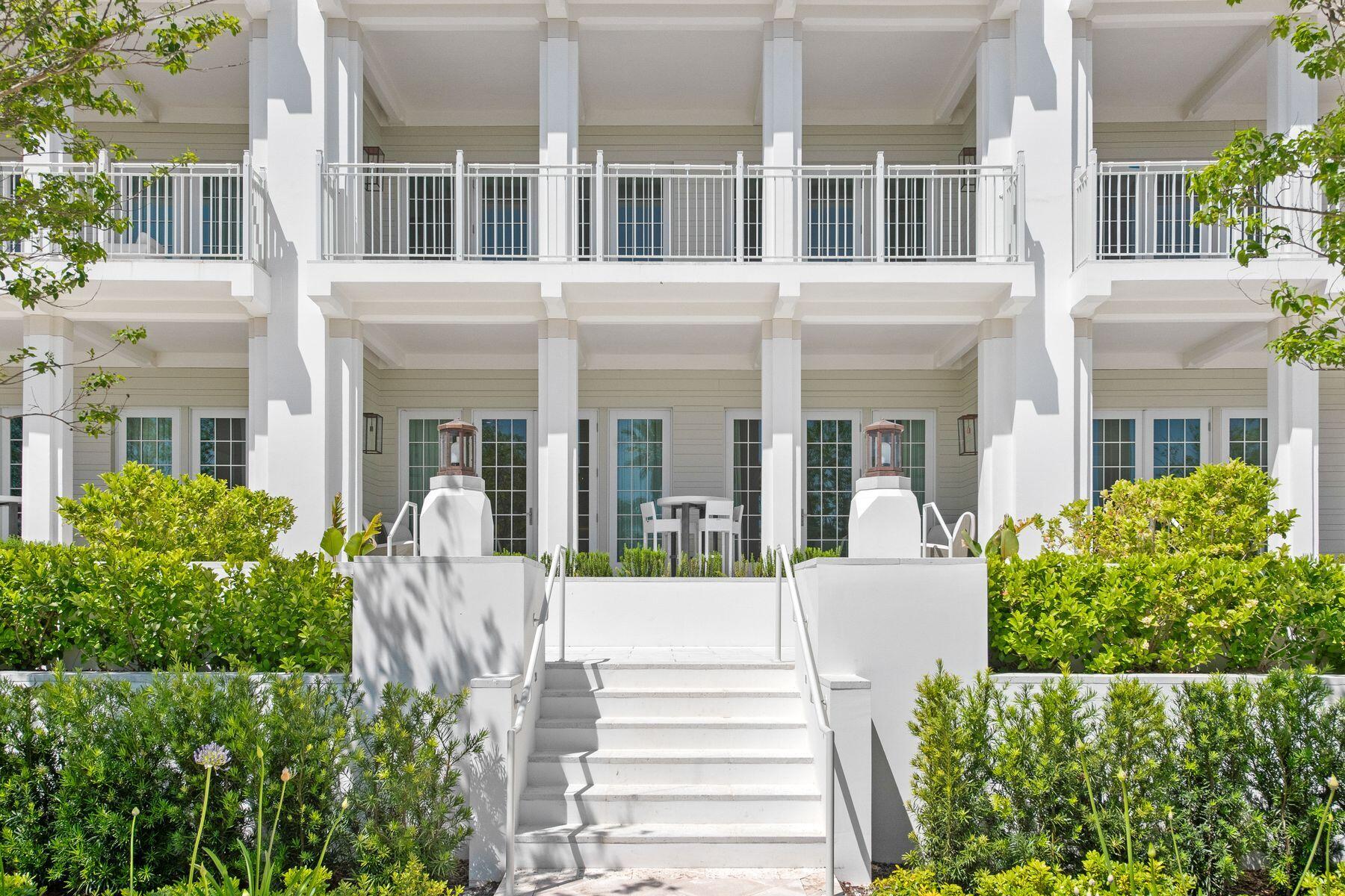 45 West Solaire Way Inlet Beach, Unit 103 Inlet Beach, FL 32461 - Photo 20 of 25 a front view of a house with a garden