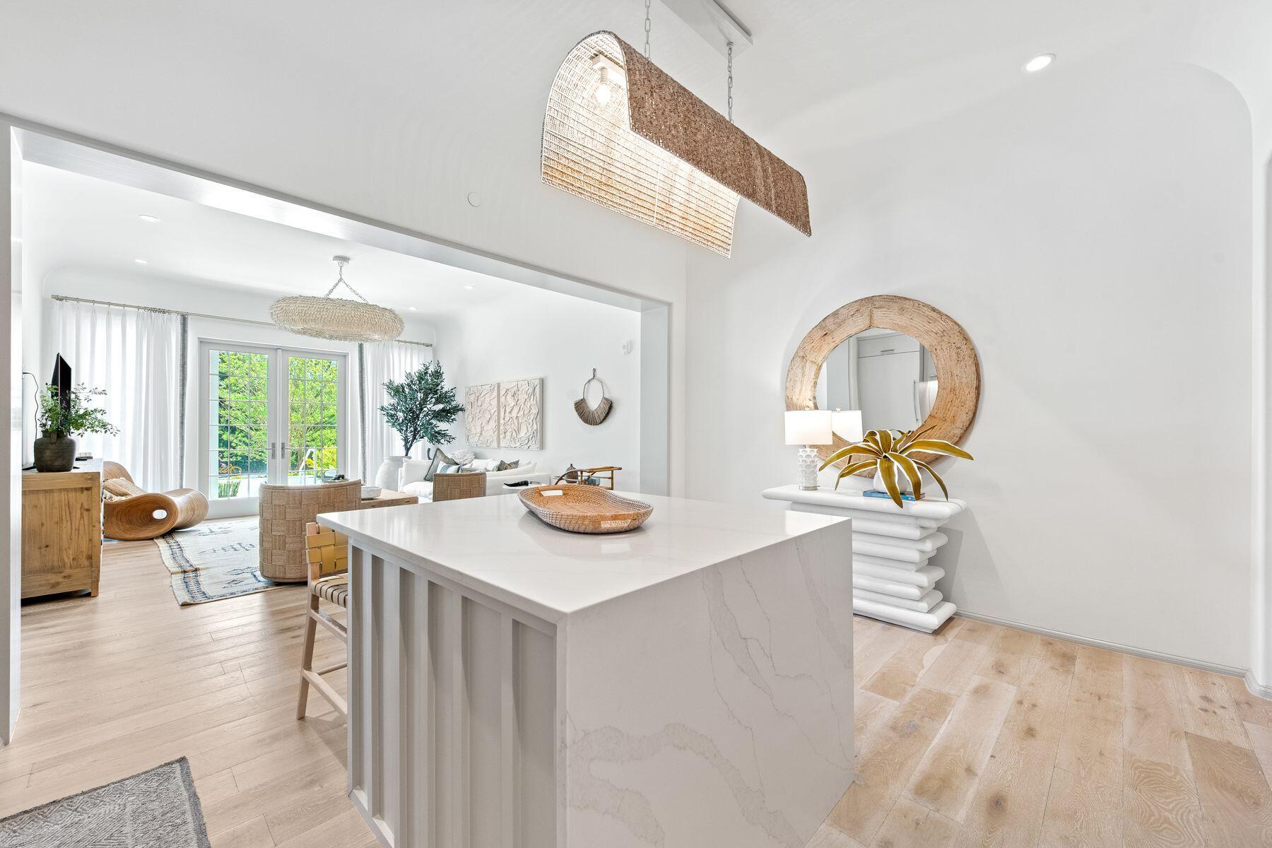 45 West Solaire Way Inlet Beach, Unit 103 Inlet Beach, FL 32461 - Photo 7 of 25 a view of a dining room with a table and chairs
