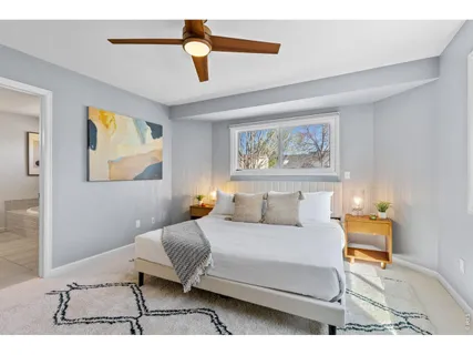 a bathroom with a sink vanity granite and a mirror
