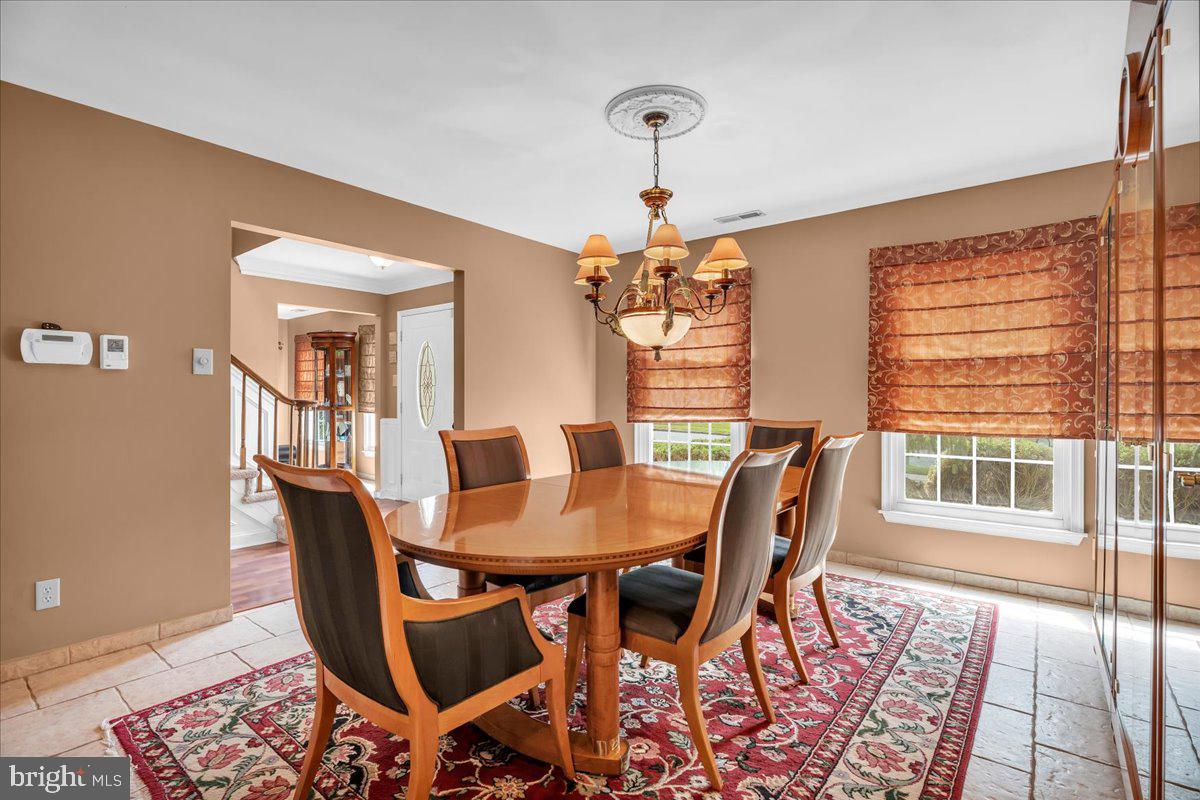 27 Spring Mill Drive Sewell, NJ 08080 - Photo 7 of 34 Elegant dining space with natural light.