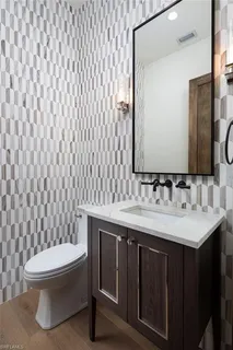 a bathroom with a sink and a toilet