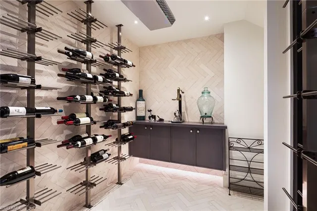 a room with lots of wooden cabinets