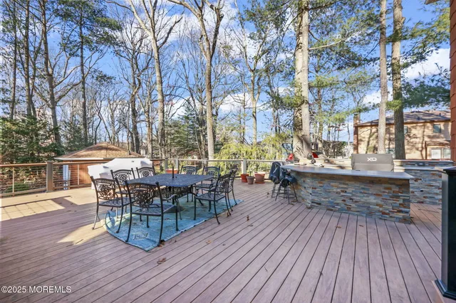a spacious bathroom with a granite countertop double vanity sink mirror and
