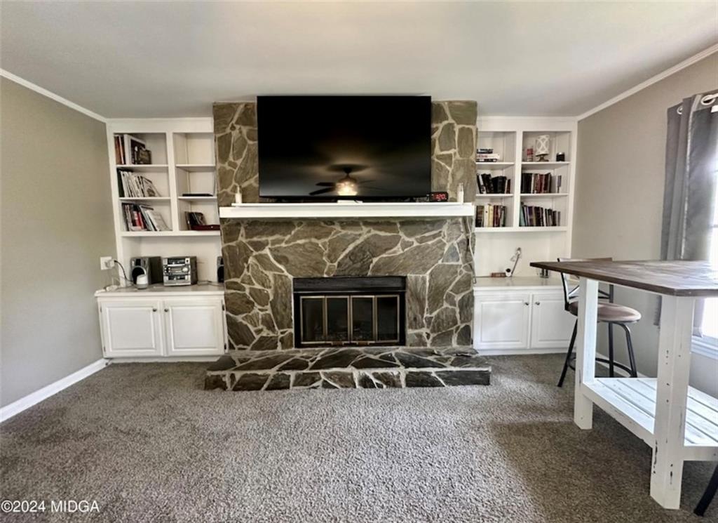 2960 Stuart Drive Macon, GA 31204 - Photo 3 of 10 a living room with furniture and a flat screen tv