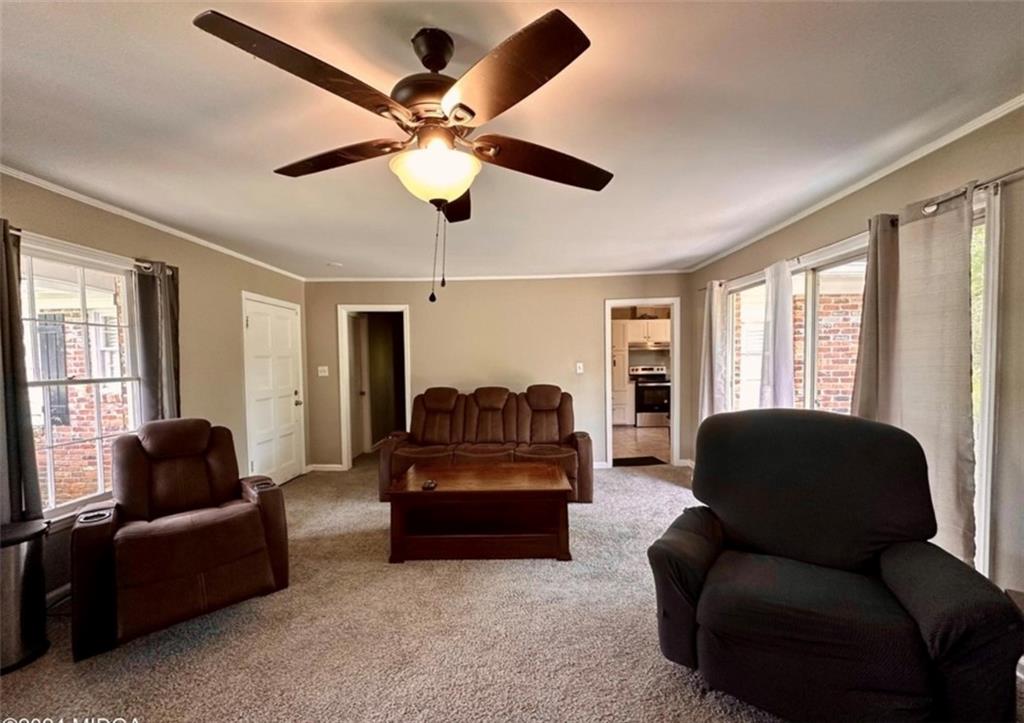 2960 Stuart Drive Macon, GA 31204 - Photo 4 of 10 a living room with furniture ceiling fan and a window