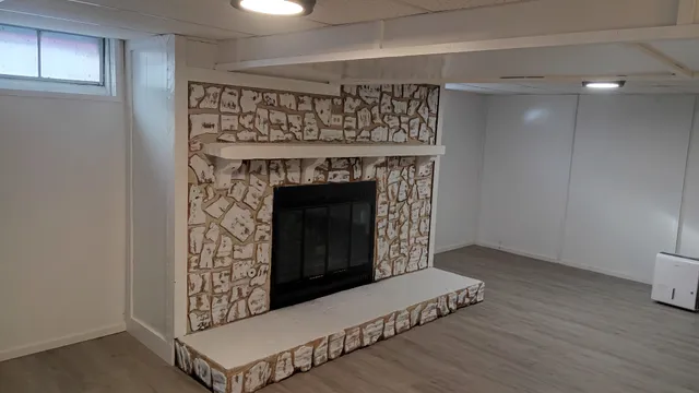 a living room with a fireplace