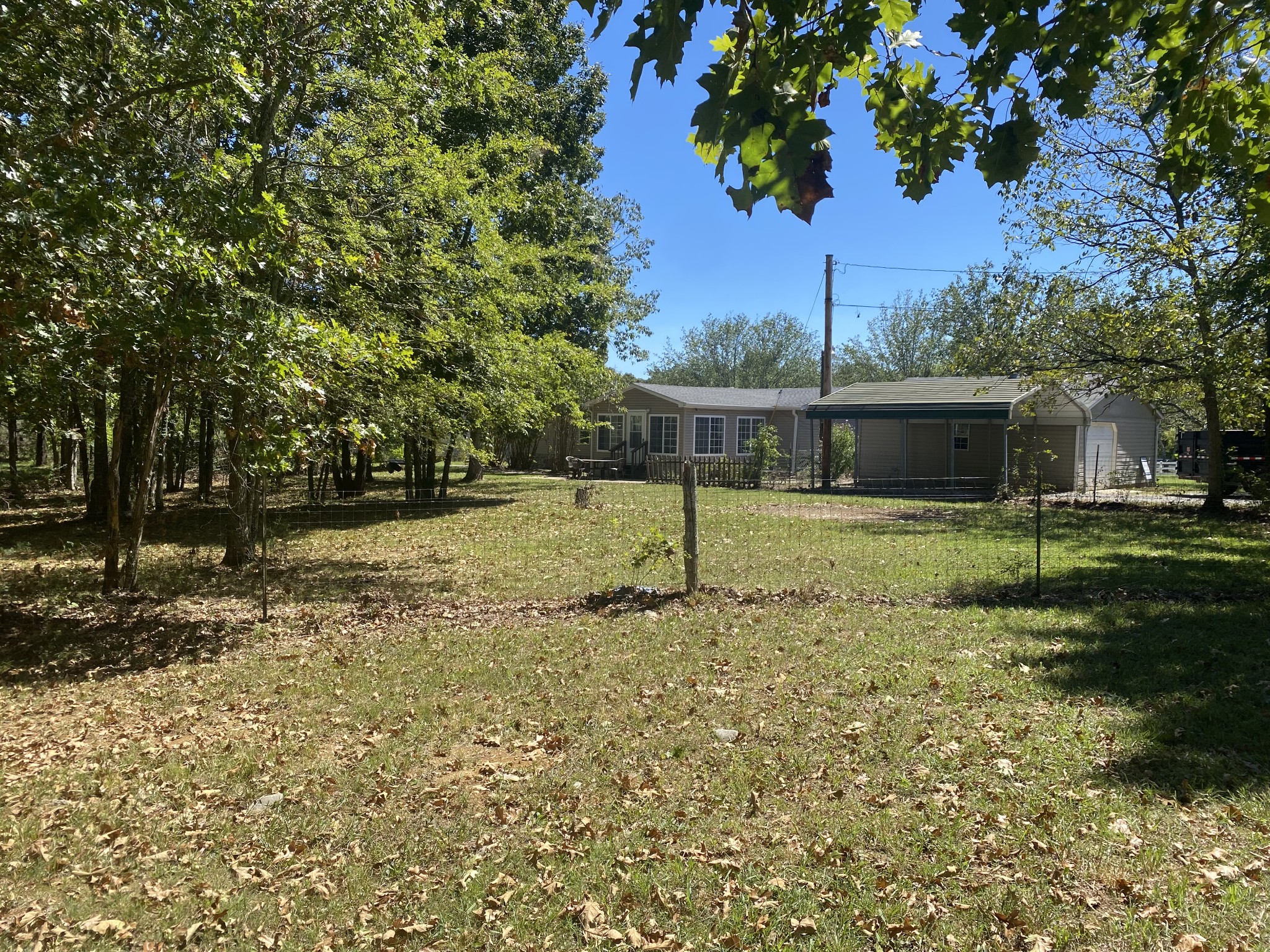 11201 New Zion Road Christiana, TN 37037 - Photo 16 of 19 a front view of a house with a yard