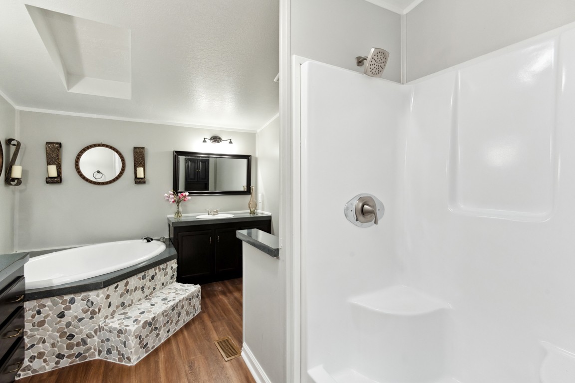 11201 New Zion Road Christiana, TN 37037 - Photo 7 of 19 a bathroom with a sink a toilet a mirror and shower